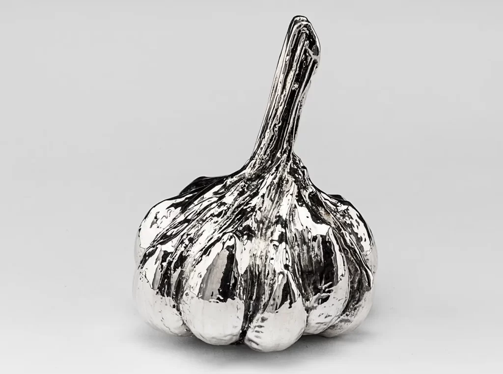 Sterling silver garlic clove to represent platinum garlic