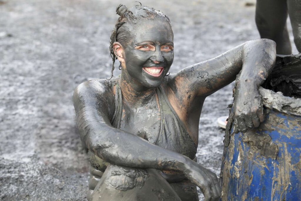 Girl Covered in Dirt to Represent Weed Strain That Starts With D Dirty Girl