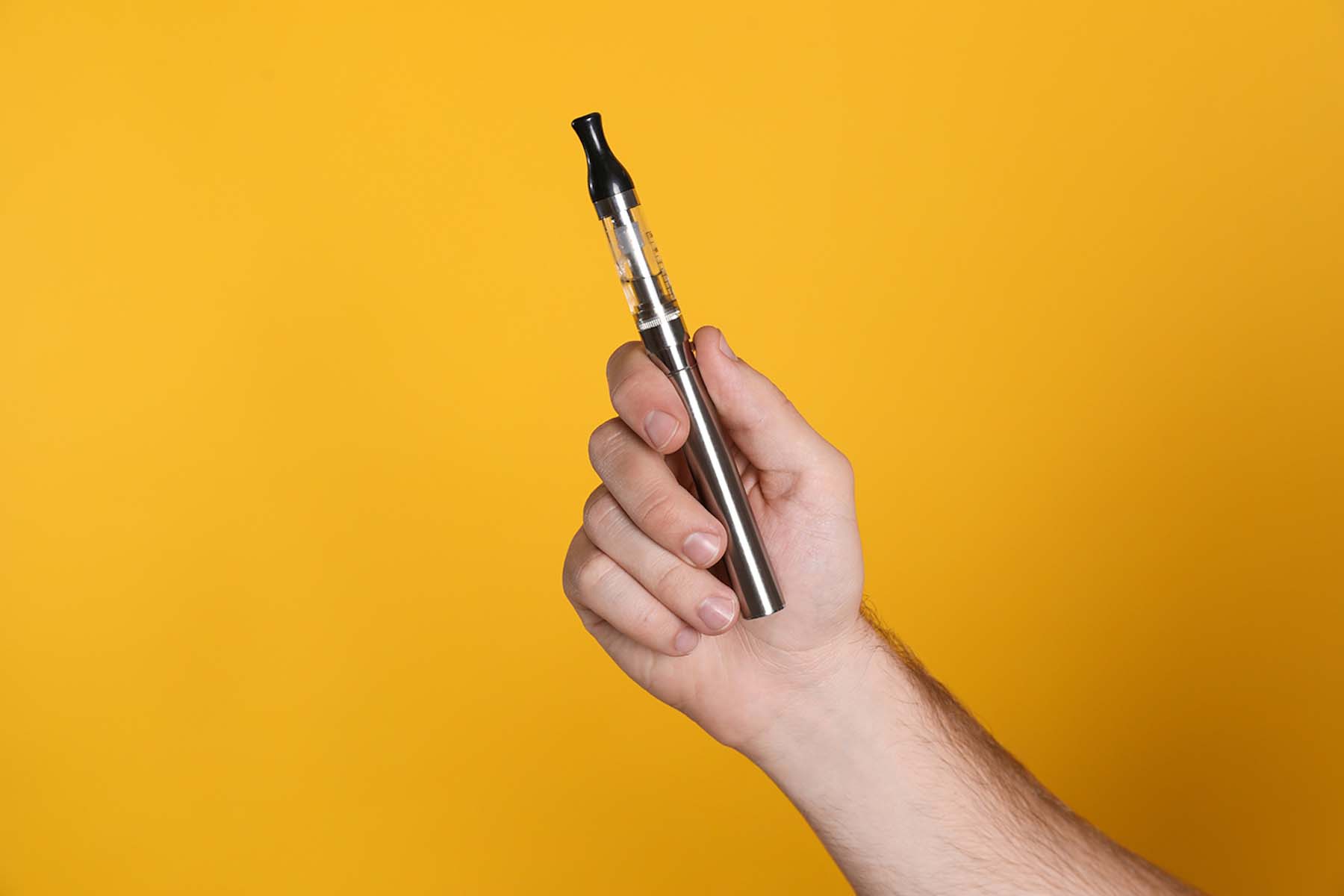 Cannabis Vape Cartridge Vape Pen in Hand