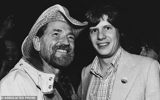 Willie Nelson (Left) and James "Chip" Carter Son of Former President Jimmy Carter