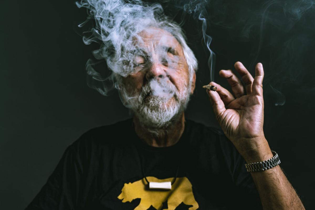 Tommy Chong Famous Stoner of Cheech and Chong Smoking Weed Blunt