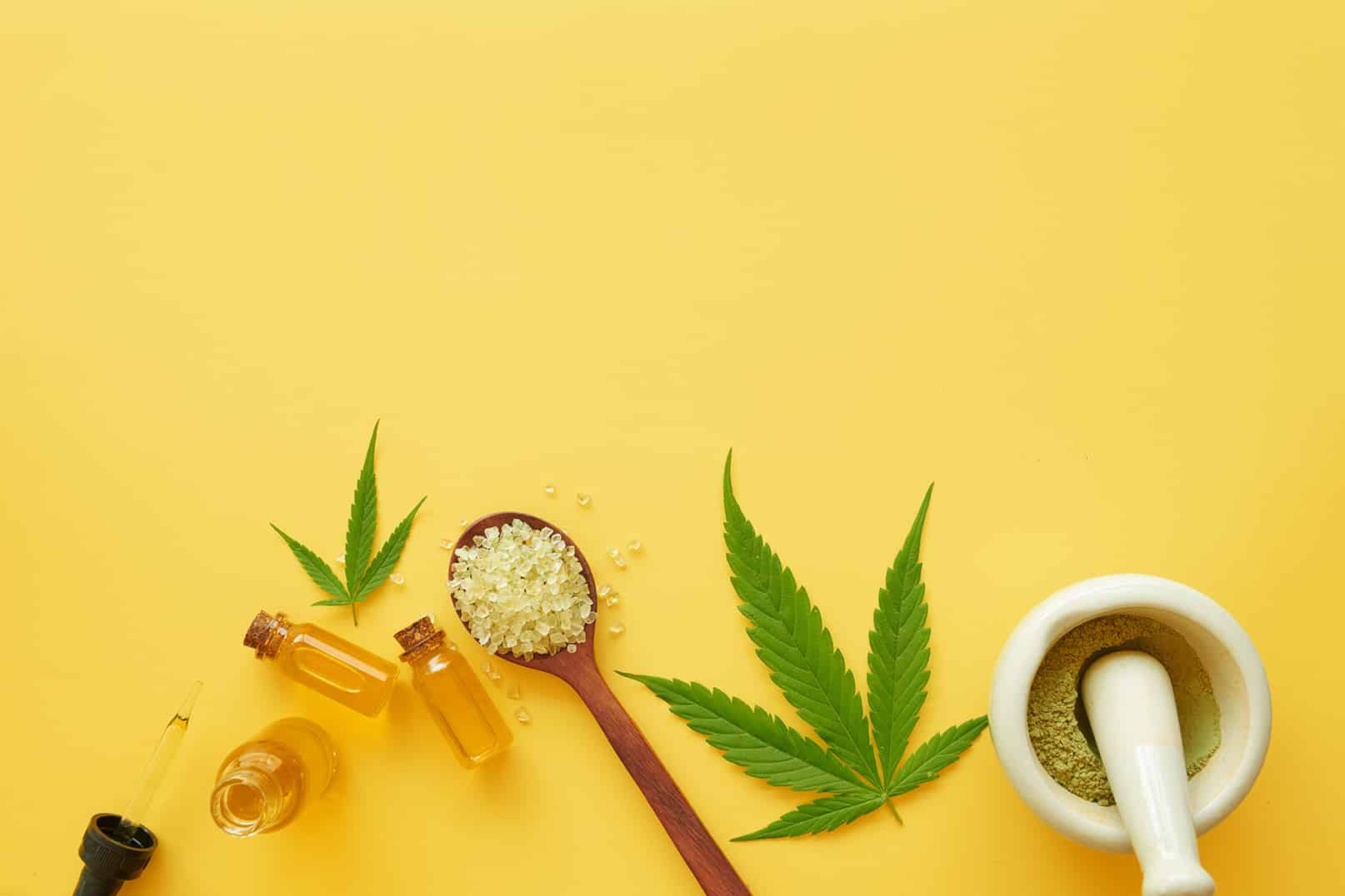 CBD Cannabis Products on a Yellow Background