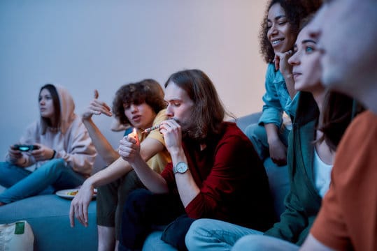 People Smoking Weed While Watching TV