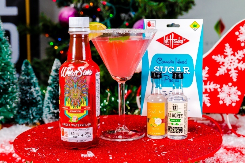 Cocktail Next to Cannabis Infused Watermelon Drink, Triple Sec, and Vodka