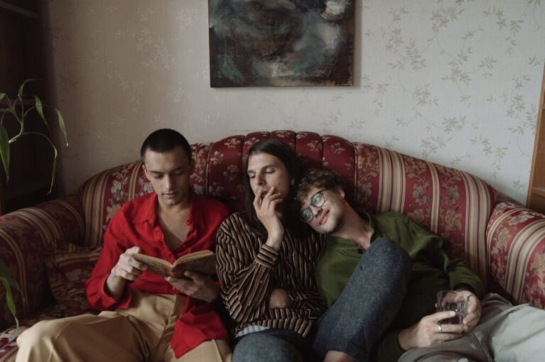 Friends Smoking Weed on a Couch Together