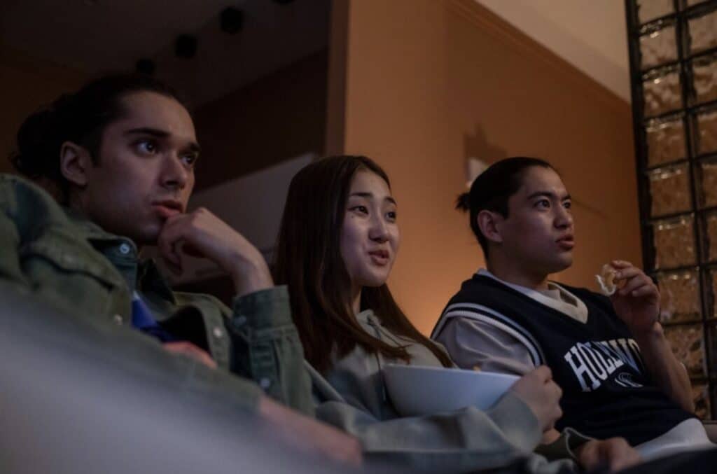 People Watching TV Together