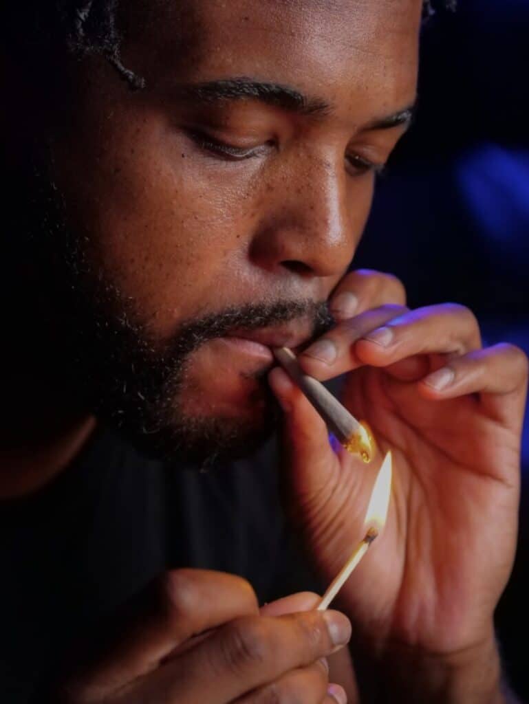 Man Lighting Joint to Smoke Weed