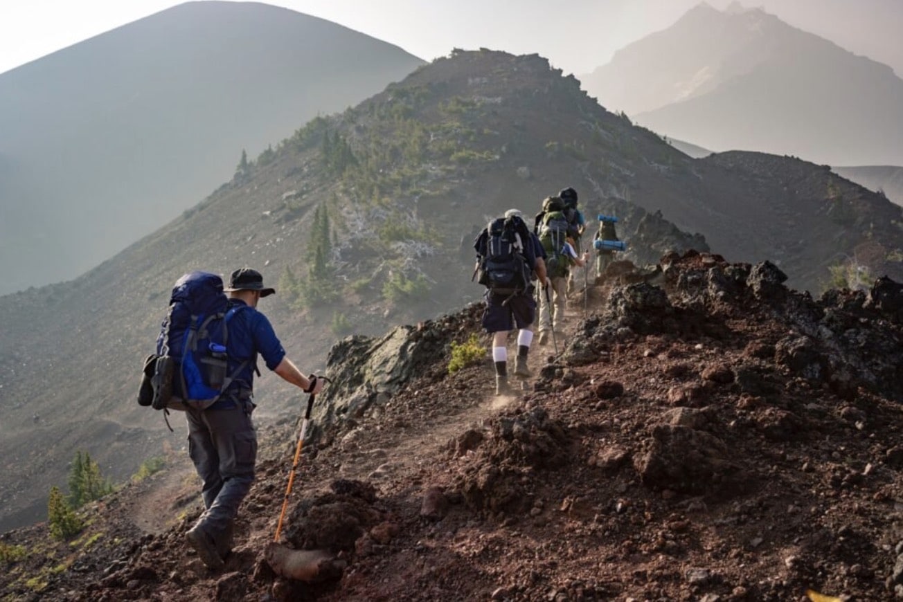 People Hiking a Mountain