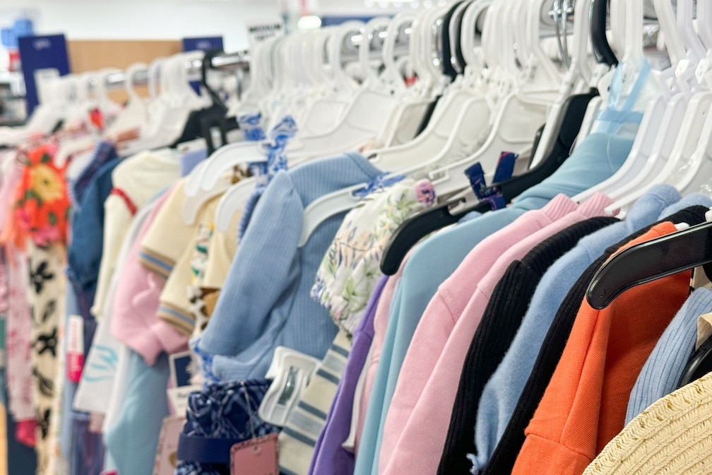 Clothing rack with clothes hanging