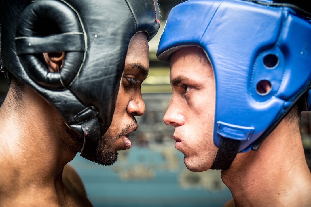 Two people face to face before a boxing match to represent the cannabis strain Face Off