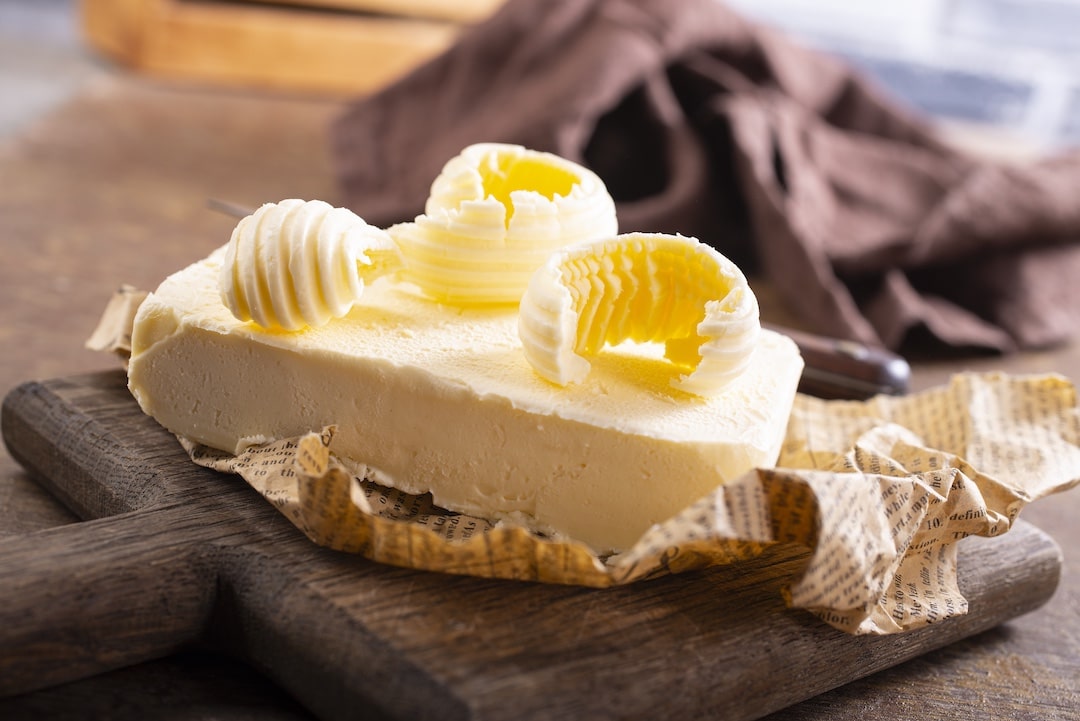 Butter with scoops taken out on top