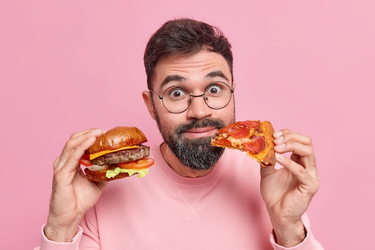 Guy with Burger and Pizza