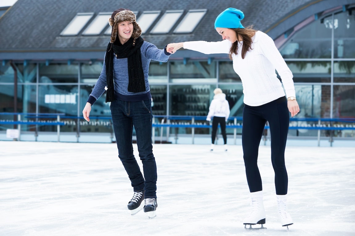 Two people ice skating