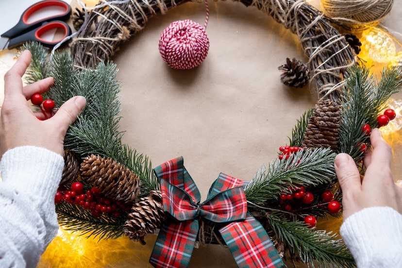 Making a Christmas wreath with your own hands. Holiday preparation, home decoration