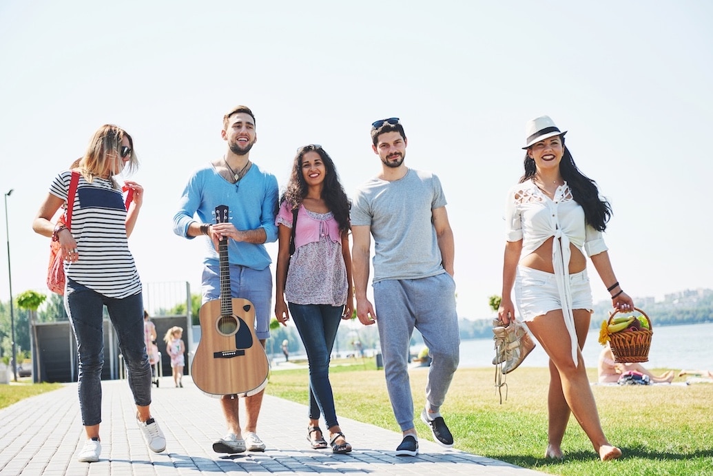 Group of Friends Walking Outside in the Summer