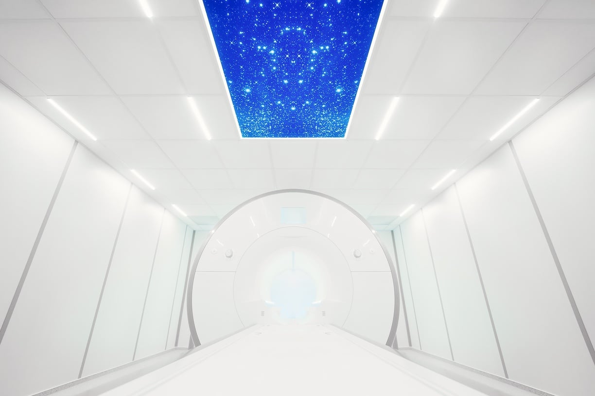 All white room with stars exposed on ceiling to represent the strain Death Star