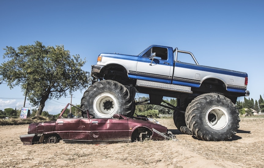 Monster Truck Crushing a Car